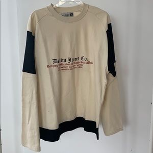 A denim Jean Co sweater.